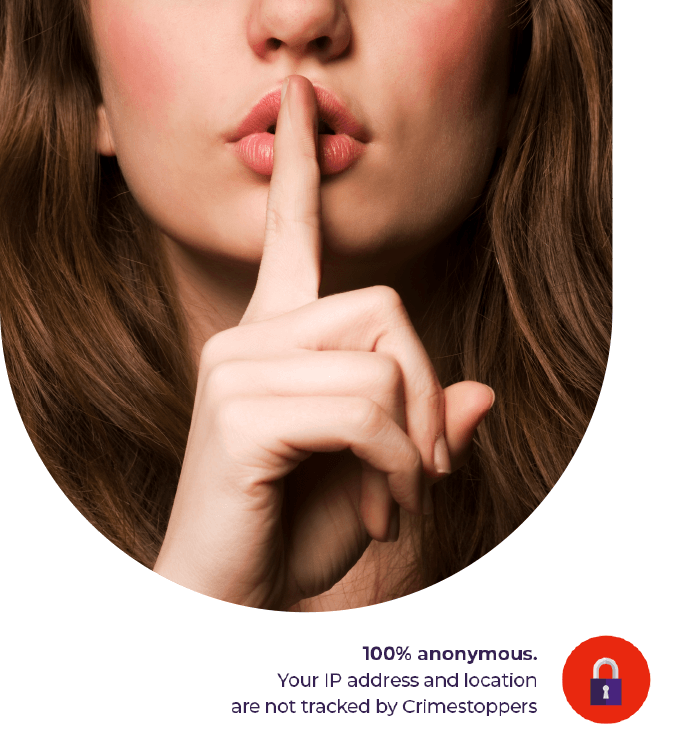 woman with finger in front of mouth