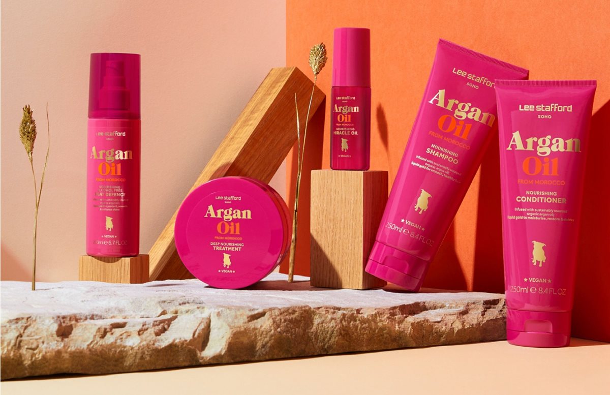 Argan Oil box types displayed against a vibrant pink background