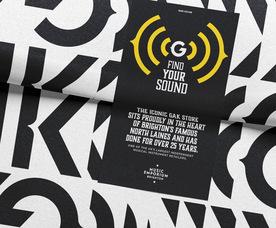 Gak logo pattern in black and white on wrapping paper