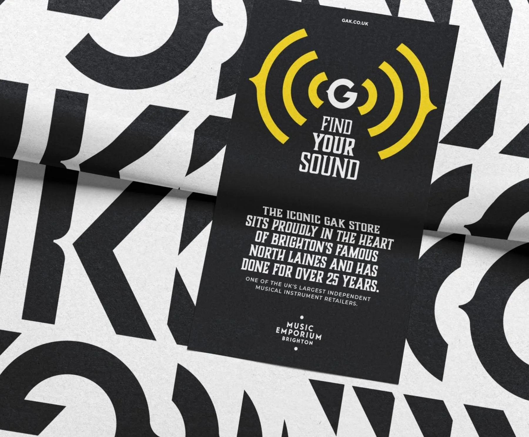 Gak logo pattern in black and white on wrapping paper